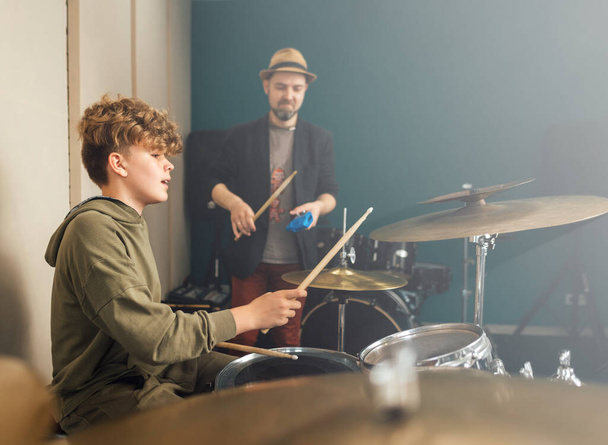 Drum lesson at a music school. - Фото, изображение