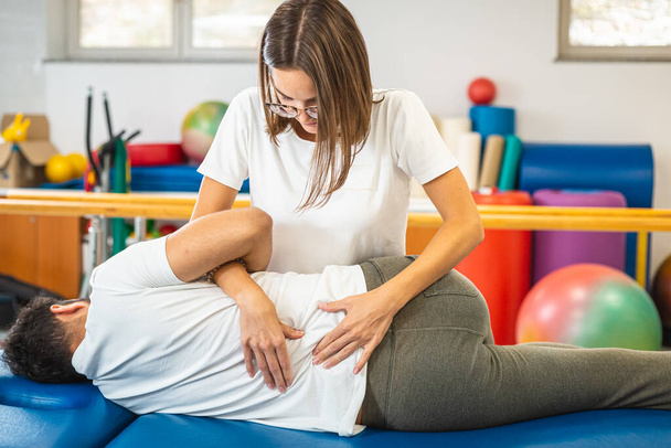 Medical back massage and exercises - Foto, imagen