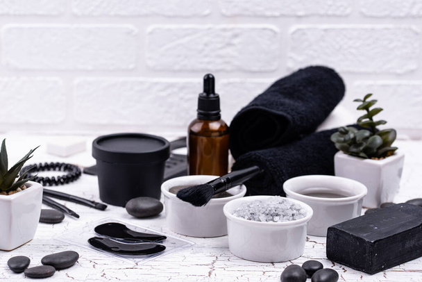 Set of black charcoal detox cosmetics - Foto, imagen