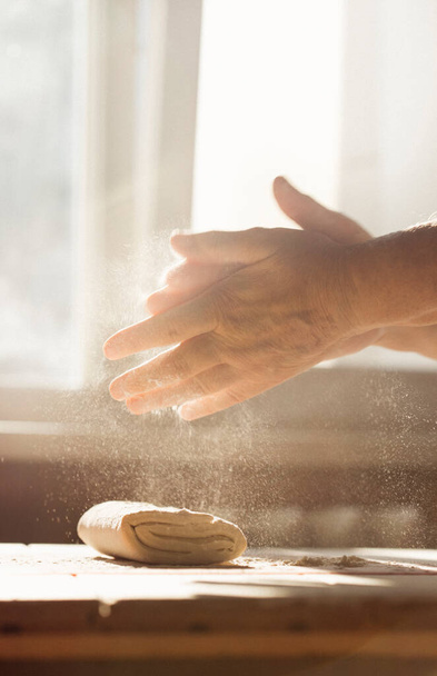 woman making homemade dough on kitchen counter, close up  - Photo, Image