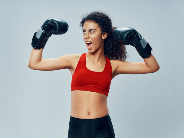 sportive woman in boxing gloves workout gym exercise - Photo, Image