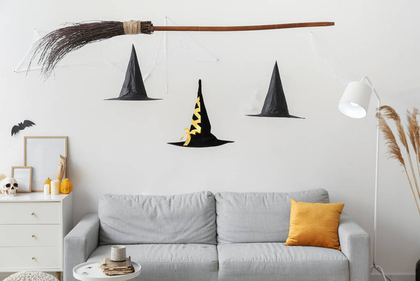 Interior of living room with creative witch's decorations for Halloween - Photo, Image