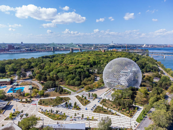Aerial view of Montreal Biosphere in summer sunny day. Jean-Drapeau park, Saint Helens Island. A museum dedicated to the environment. - Photo, Image