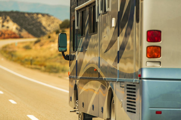 Class A Diesel Pusher RV Motor Coach on a Scenic Highway. Recreational Vehicle Theme. - Photo, Image