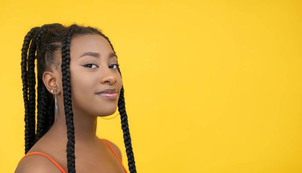 confident african woman cultural diversity orange - Valokuva, kuva