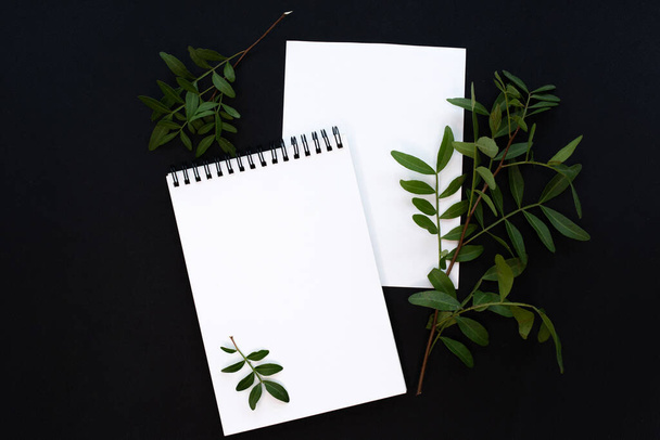 White notebook mockup template on black background with magical mysterious mood. - Foto, immagini