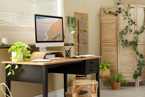 Light room interior with comfortable workplace near window - Photo, Image