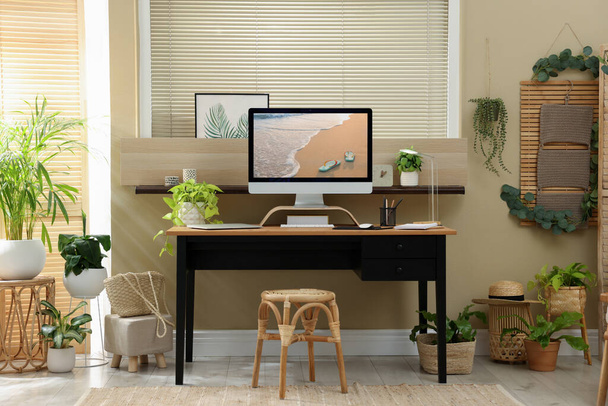 Light room interior with comfortable workplace near window - Photo, Image