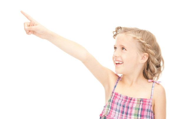 Little girl pointing her finger - Fotó, kép