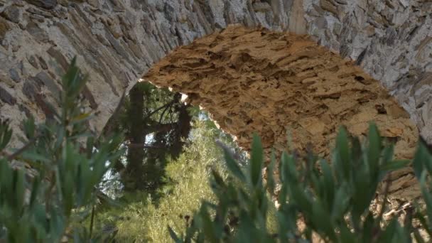 Bogen in einem antiken römischen Aquädukt bei Sonnenuntergang, Almuecar, Granada, Spanien. Detail - Filmmaterial, Video