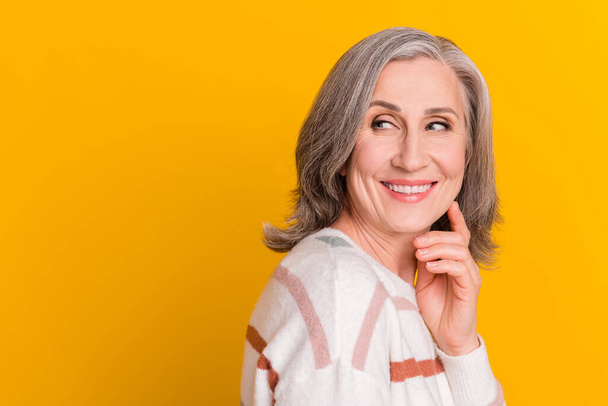 Profile side view portrait of attractive cheerful grey-haired woman overthinking copy space isolated over bright yellow color background - Φωτογραφία, εικόνα