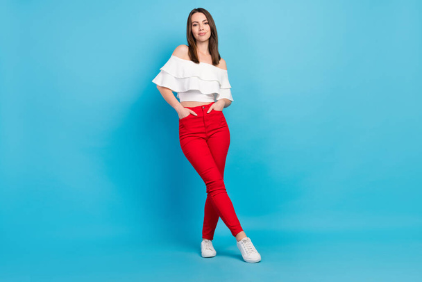Full length body size view attractive cheery fashionable girl posing isolated over vibrant blue color background - Fotografie, Obrázek