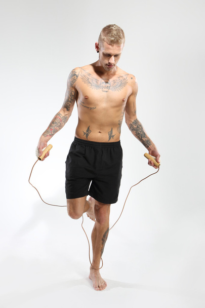 Jumping rope exercises with jump rope - Fotoğraf, Görsel