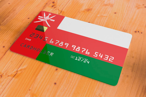 Plástico de crédito ou cartão de débito bancário com bandeira do país do sistema bancário nacional Omã isolado na mesa de madeira close up conceito de imagem de renderização 3d - Foto, Imagem