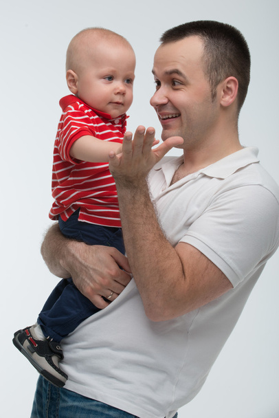 Father holding his son, cute baby boy - Foto, Bild