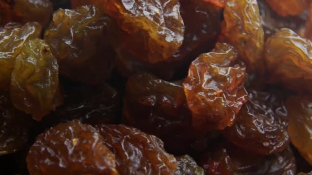 Light raisins close-up rotates in a circle - Footage, Video