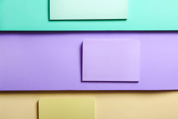 Stylish notebooks on color background - 写真・画像