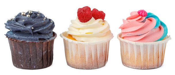 Three cupcakes close up isolated on white background - Φωτογραφία, εικόνα