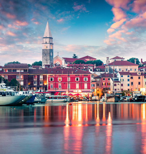 Unbelievable spring sunset of old fishing town Isola. Colorful evening scene of Slovenia, Europe. Beautiful seascape of Adriatic Sea. Traveling concept background. Artistic style post processed photo. - Photo, Image