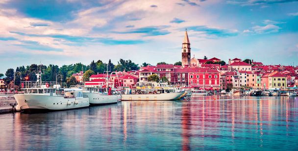 Panoramic evening cityscape of old fishing town Isola. Colorful summer seascape of Adriatic Sea. Beautiful outdoor scene of Slovenia, Europe. Traveling concept background.  - Photo, Image
