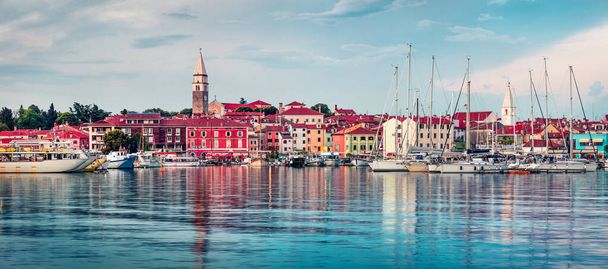 Colorful evening cityscape of old fishing town Isola. Fantastic spring seascape of Adriatic Sea. Beautiful evening panorama of Slovenia, Europe. Traveling concept background.  - Photo, Image