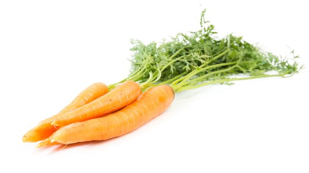 Carrot vegetable with leaves - Фото, зображення