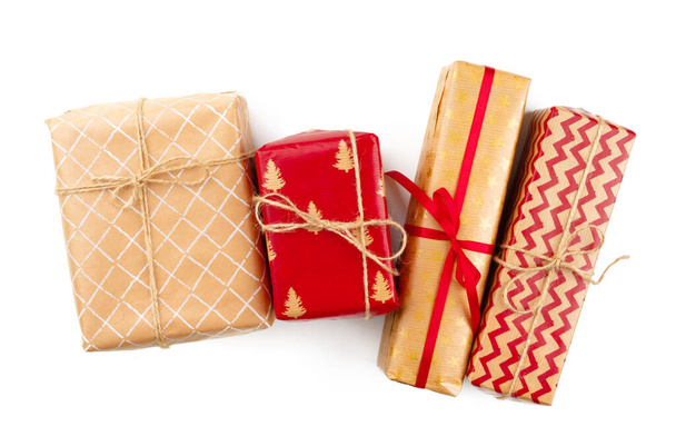Wrapped christmas presents isolated on white background - 写真・画像