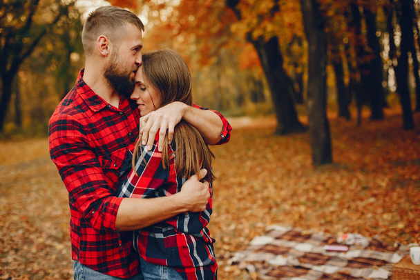 Elegant couple spend time in a autumn park - Photo, Image
