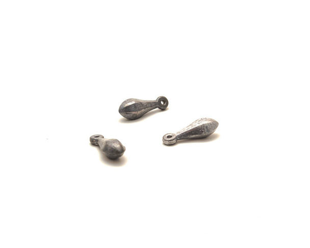 Three silver bank sinkers fishing accessories isolated on white background. Half ounce fishing terminal tackle weight to keep your bait and lure at an effective depth for ground, bottom fishing - Photo, Image