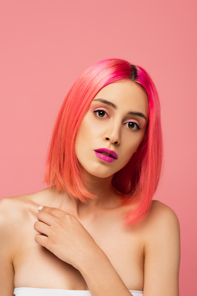 young woman with bright colorful hair and makeup isolated on pink  - Foto, afbeelding