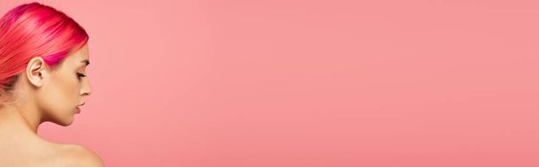 profile of pretty young woman with colorful hair and bare shoulder isolated on pink, banner - Photo, Image