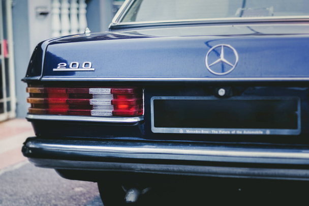 HUTAN MELINTANG, MALAYSIA - Aug 28, 2021: A Mercedes-Benz 200 (W123) classic German midsize luxury 1980s car parked near Teluk Intan, Malaysia - Zdjęcie, obraz