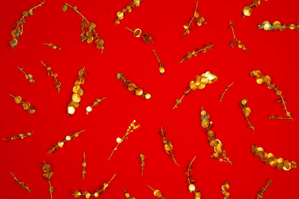 Christmas pattern of holiday decorations on red background - Foto, Imagem