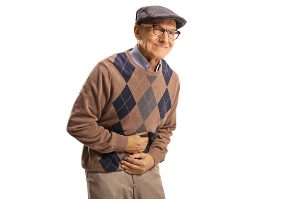Elderly man experiencing abdominal pain isolated on white background - Foto, Bild
