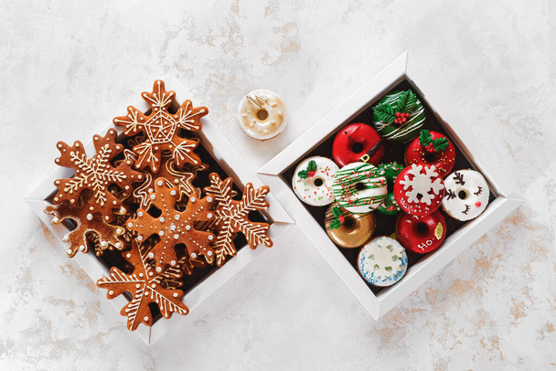 Christmas Cookie Boxes. Cardboard boxes with donuts and gingerbread as a gift. Top view, blank space - Zdjęcie, obraz