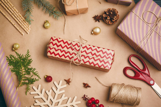 Getting ready for christmas, wrapping gifts and making decorations - 写真・画像