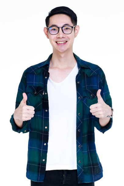 cutout portrait of happy young healthy man on white casual and long sleeve shirt standing with smile and exciting on perfect proposal he get so his thumbs up as satisfy on that wonderful thing - 写真・画像