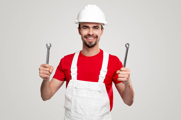 Friendly handyman with professional tools - Foto, Imagen