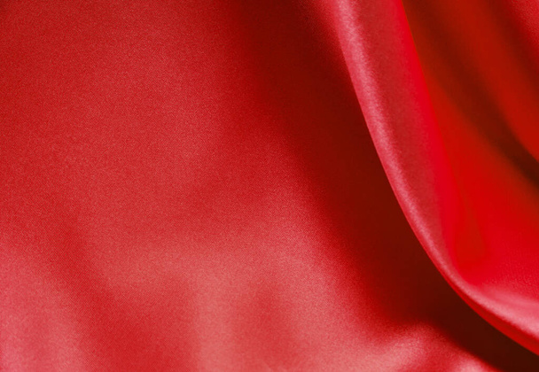 Červený satén nebo hedvábí tkaniny jako pozadí - Fotografie, Obrázek