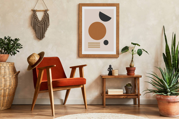 Creative composition of stylish living room interior with mock up poster frame, armchair, coffee table, cacti and personal and boho accessories. Plant love and nature concept. Template. - Фото, зображення