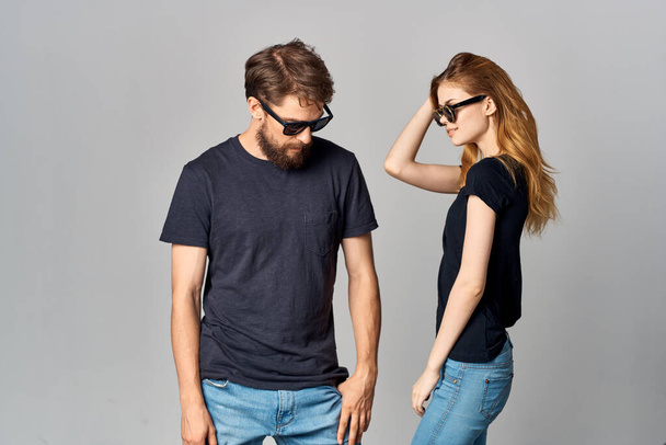 married couple friendship communication romance wearing sunglasses light background - Foto, imagen