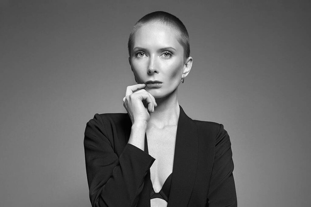 Fashionable beautiful woman with short hair. beauty fashion blond woman. Age. Black and white portrait - Photo, Image