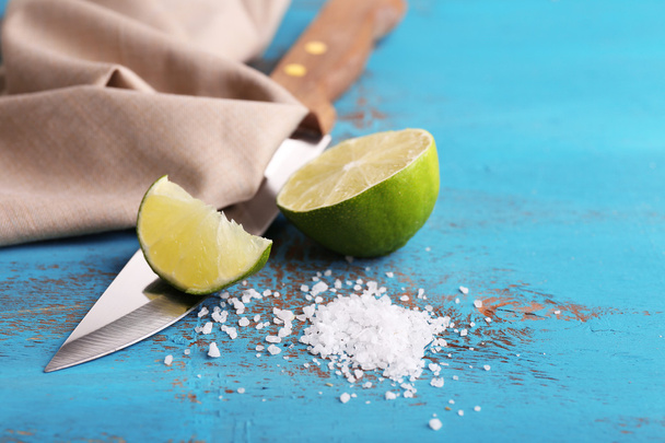 Fresh lime, knife and salt - Fotó, kép