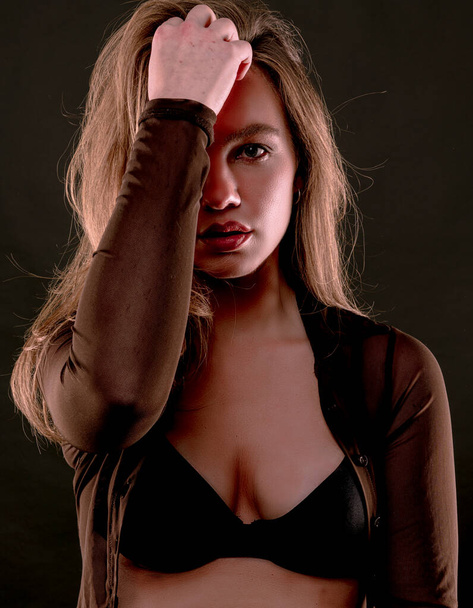 beautiful sexy blonde woman in black lingerie - Fotó, kép