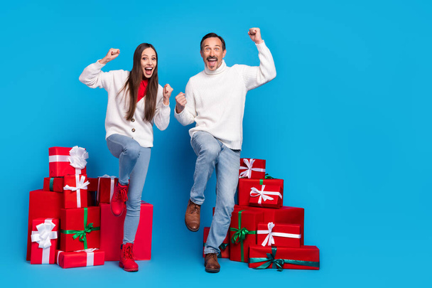 Full length body size view of nice lucky cheerful couple rejoicing dancing december discount isolated over bright blue color background - Photo, image
