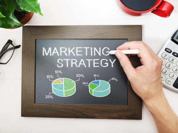 Marketing strategy sketched on chalkboard - Фото, зображення