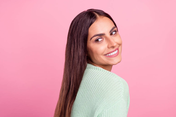 Profile photo of curious young brunette lady look empty space wear green pullover isolated on pink color background - Фото, зображення