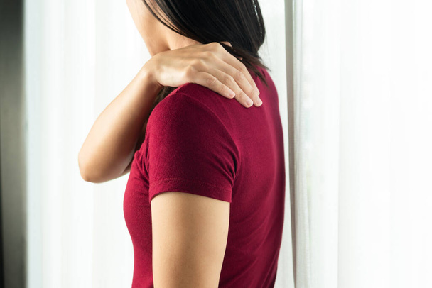 young women neck and shoulder pain injury, healthcare and medical concept - Foto, afbeelding