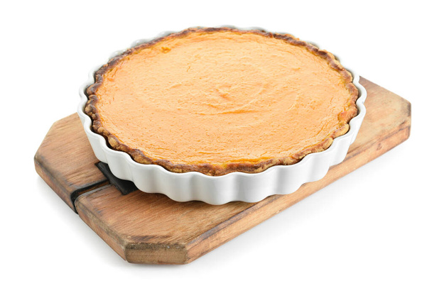 Baking dish with tasty pumpkin pie on white background - Photo, Image