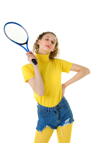Portrait of happy girl posing with tennis racket - Fotografie, Obrázek
